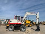 1997 Takeuchi TB070W wheel excavator side view