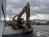 2019 Caterpillar 330FLN crawler excavator, front three-quarter view