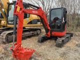 2024 Kubota U35 mini excavator, front three-quarter view