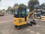 2023 Caterpillar 301.8 mini excavator rear three-quarter view