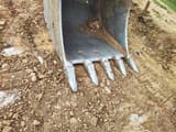 2002 O&K RH 12.5 crawler excavator bucket close-up