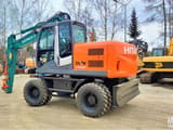 2012 Hitachi Zaxis 140W wheel excavator, side profile view
