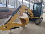 2022 Caterpillar 306E2 mini excavator, side view