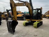 2025 Caterpillar 307.5 crawler excavator, front three-quarter view