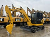 2022 Komatsu PC58 crawler excavator, front three-quarter view