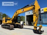 2022 Caterpillar 320-07D crawler excavator, side view