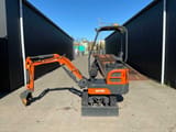 Kubota SD15E mini excavator, side view