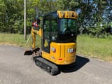 2023 Caterpillar 301.6 mini excavator, rear three-quarter view