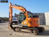 2019 Doosan DX140LCR-5 crawler excavator, rear three-quarter view