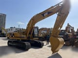 2022 Caterpillar 320BL crawler excavator, side view
