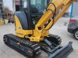 2023 Komatsu PC35MR mini excavator, front three-quarter view