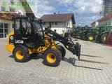 2022 JCB 403 mini excavator, side view with pallet forks