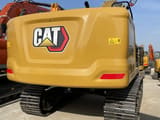 2023 Caterpillar 320GC crawler excavator, rear view
