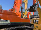 Doosan DX340LC-9C crawler excavator side view