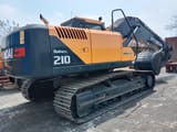 2025 Hyundai Robex 210 crawler excavator, rear three-quarter view