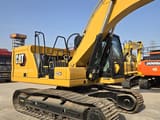 2023 Caterpillar 323GC crawler excavator, side view