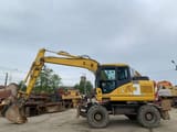 2007 Komatsu PW140-7 wheel excavator side view