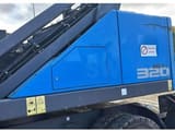 2017 Fuchs MHL320F material handler side view