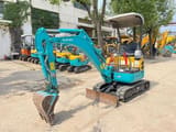 2024 Kubota U15 mini excavator, front three-quarter view