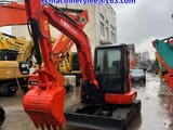 2024 Kubota KX155 mini excavator, front three-quarter view