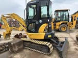 2011 Komatsu PC35MR mini excavator, front three-quarter view