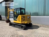 2021 Caterpillar 306CR-07A mini excavator, rear three-quarter view