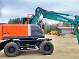 2012 Hitachi Zaxis 140W wheel excavator, side view