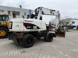 2010 Caterpillar M316D wheel excavator, rear three-quarter view
