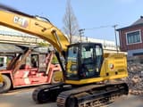 2021 Caterpillar 320 crawler excavator, side view