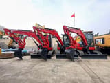 2023 Kubota KX057-4 mini excavator, front-side view