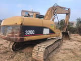 2011 Caterpillar 320C crawler excavator, rear three-quarter view