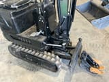 2026 Nuoman 1.2T mini excavator, high-angle view of operator station and tracks