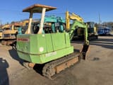 Mitsubishi ME30 mini excavator, rear three-quarter view