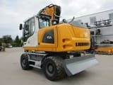 2023 Liebherr A914 Litronic wheel excavator, rear three-quarter view