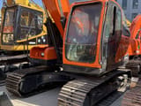 2022 Doosan DX140LC-9C crawler excavator, front three-quarter view