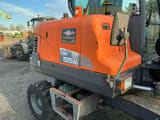 2015 Doosan DX55W mini excavator side view