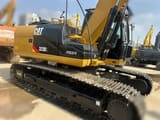 2023 Caterpillar 323DL crawler excavator side view