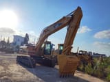 2023 Caterpillar 325BL crawler excavator, front three-quarter view