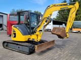 2014 Komatsu PC55MR-3 crawler excavator, side view