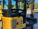 2022 Caterpillar 301.8-05A mini excavator, rear three-quarter view