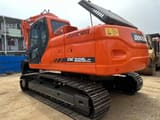 2016 Doosan DX225LC crawler excavator, rear three-quarter view
