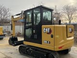 2023 Caterpillar 305.5GC crawler excavator, rear three-quarter view