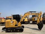 2023 Caterpillar 305.5E2 mini excavator, side profile view