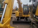 2023 Komatsu PC128US crawler excavator, rear view
