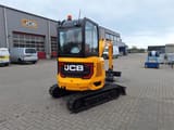 2024 JCB 26C-1 mini excavator, rear three-quarter view