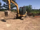 2020 Caterpillar 305.5 mini excavator, front three-quarter view