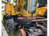 2013 Atlas 1404 ZW wheel excavator rear three-quarter view