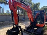 2023 Kubota KX165-5 mini excavator, front three-quarter view