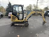 2013 Caterpillar 302.2D mini excavator, side view