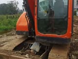 Doosan DX75-9C excavator, front-side view